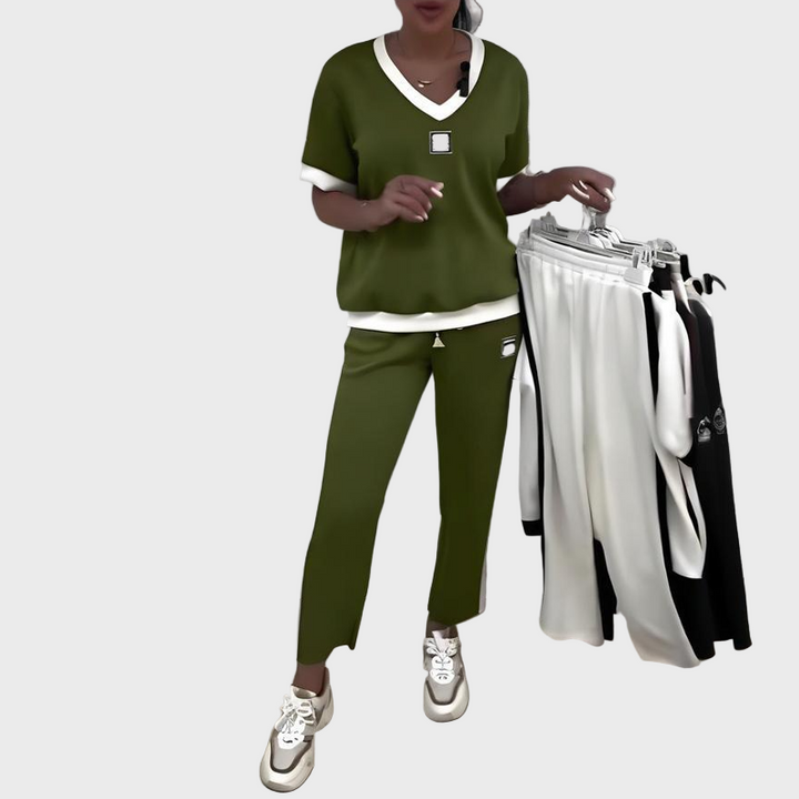 Set feminin cu top și pantaloni cu decolteu în V