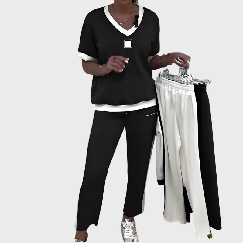 Set feminin cu top și pantaloni cu decolteu în V