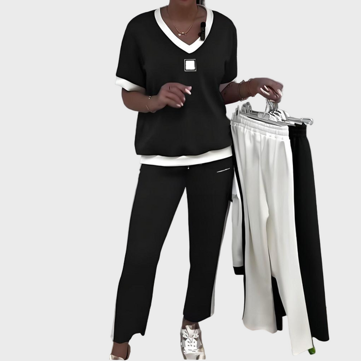 Set feminin cu top și pantaloni cu decolteu în V