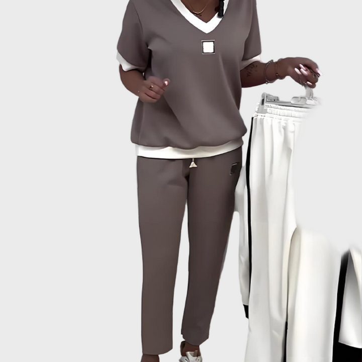 Set feminin cu top și pantaloni cu decolteu în V